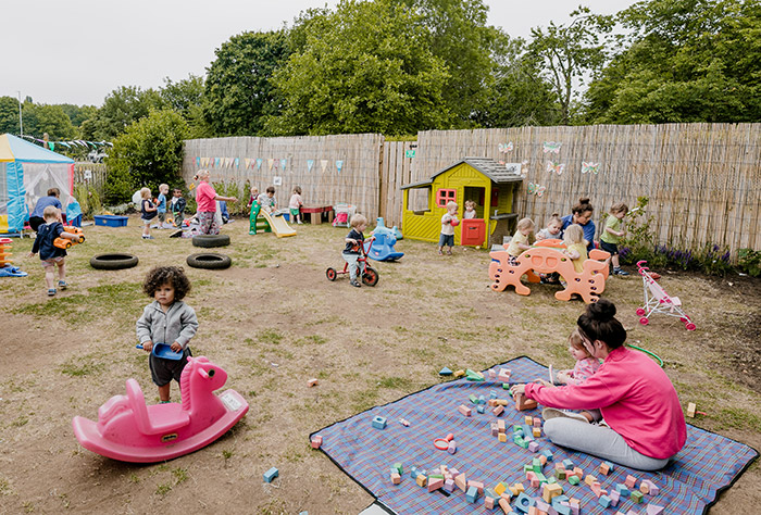 Culham Nursery babies playing outside in the custom learning space