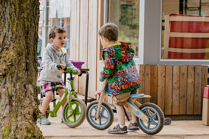 Lower preschool children exploring possibilities